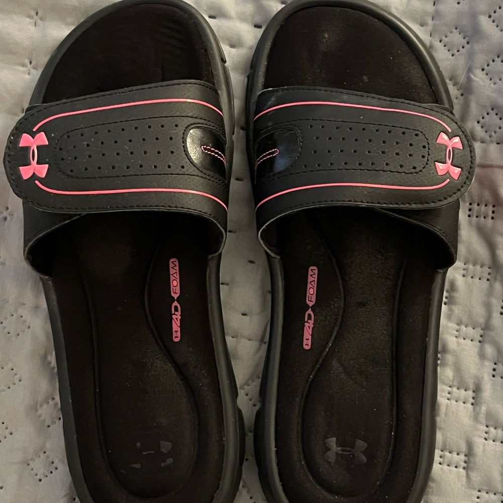 Women’s Under Armour pink and black slides
